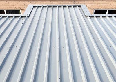 Over cladding of existing roof – Local Community Centre